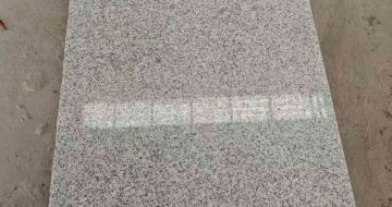 临沧芝麻白光面毛板